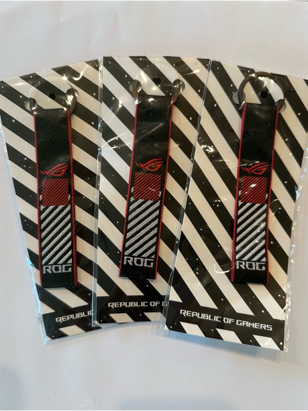 Set Of 3 Republic Of Gamers (ROG) Red, Black, & White Key Chains